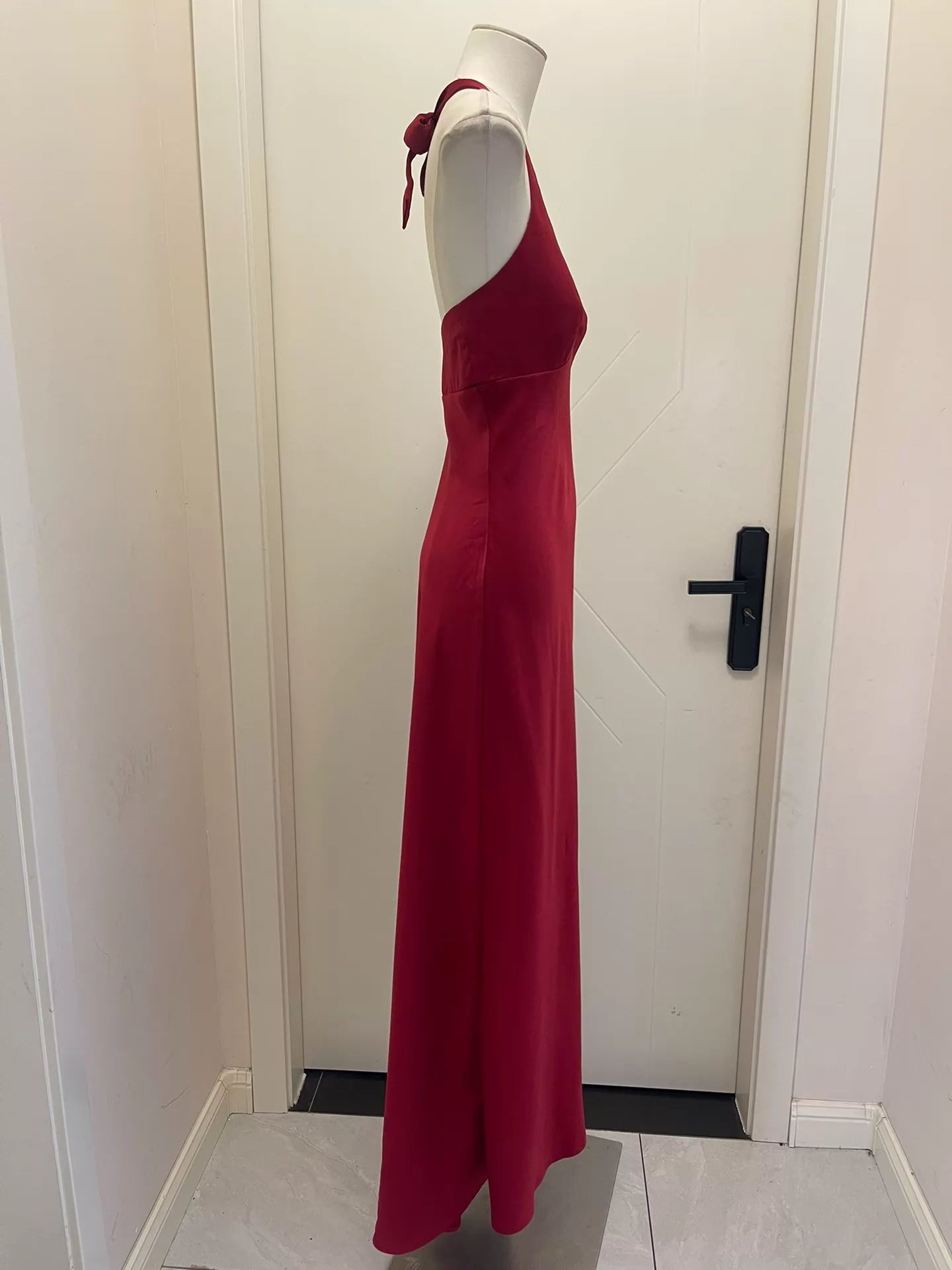 BCBGMAXAZRIA burgundy satin gown — hem view