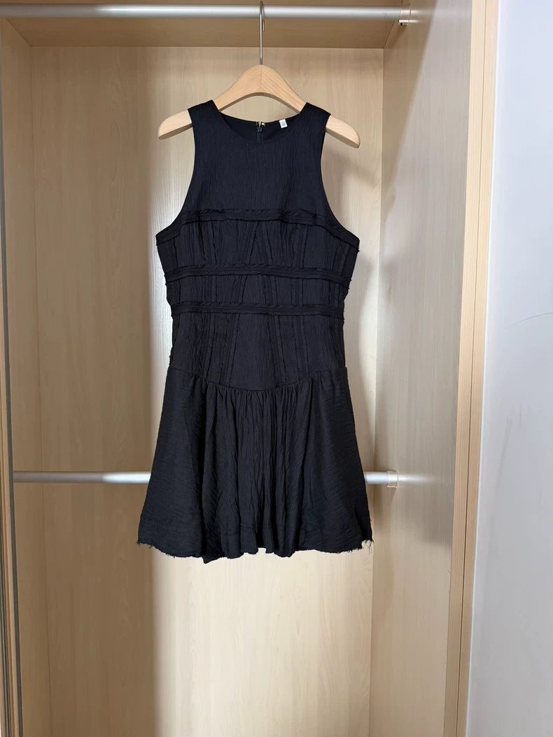 Black tiered mini dress — model front view