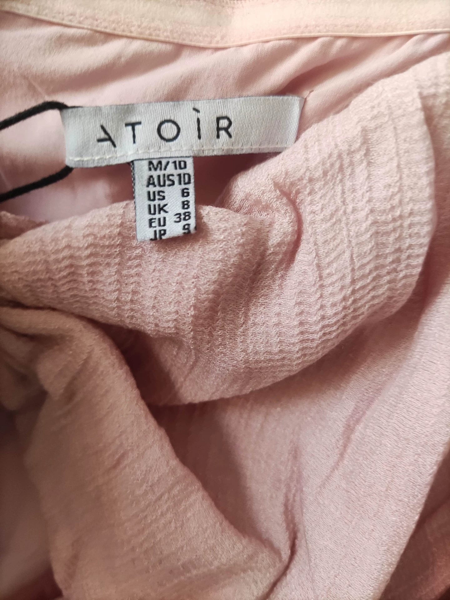 ATOIR rose-pink dress — brand label
