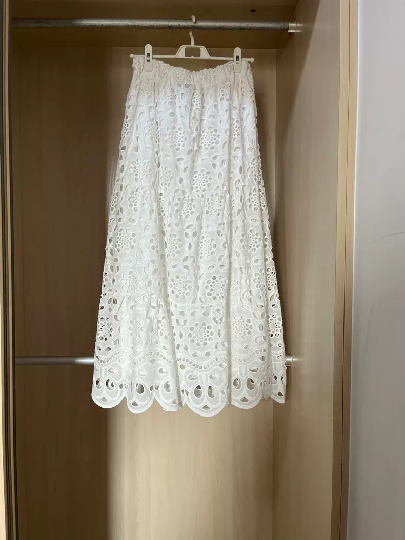 Ivory embroidered maxi skirt — waistband detail