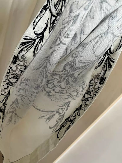 Floral-border trousers — waistband and drawstring detail