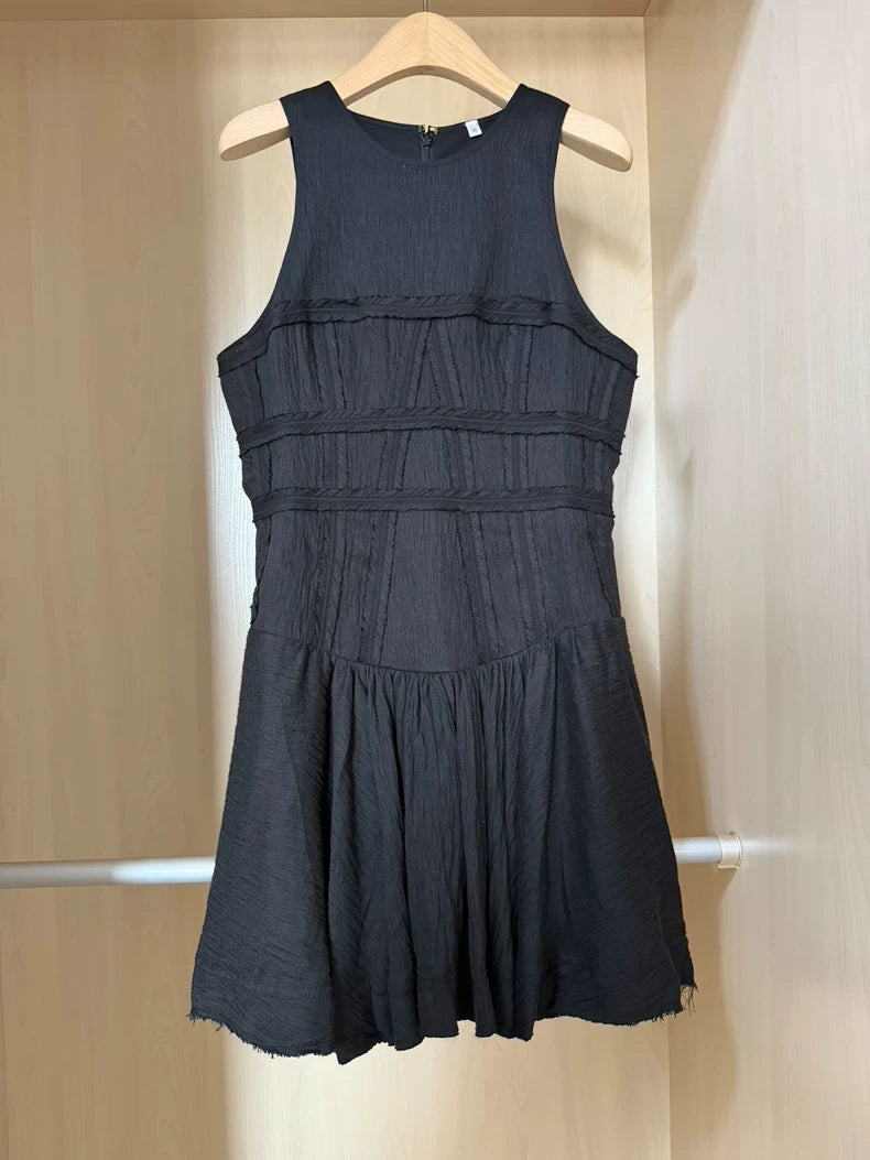 Black tiered mini dress — garment detail