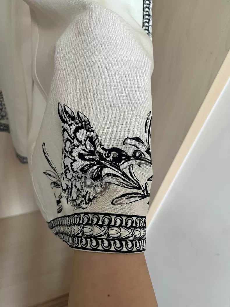 Floral-border trousers — print placement detail