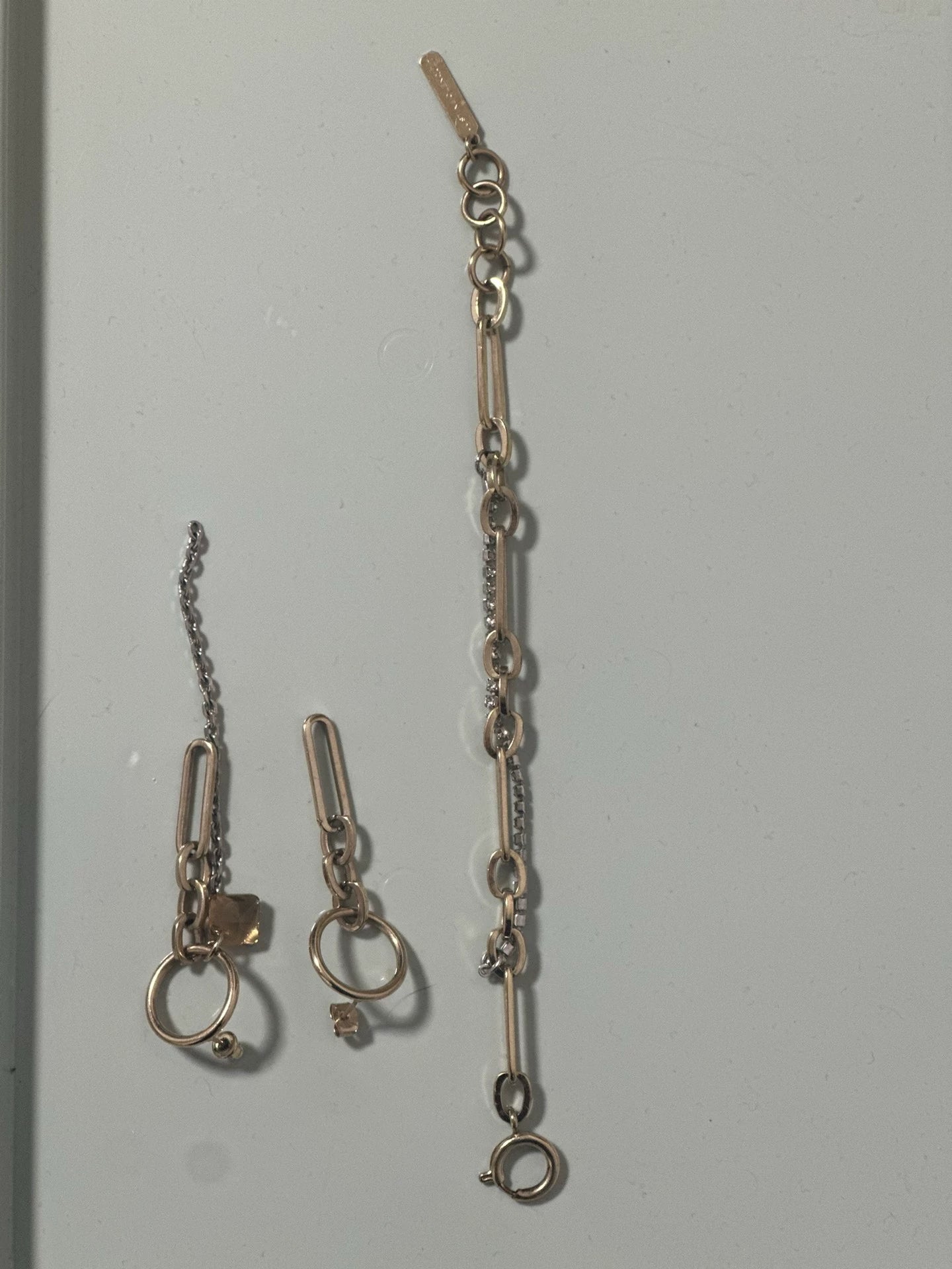 Justine Clenquet Bracelet and Asymmetric Earrings Set — front view