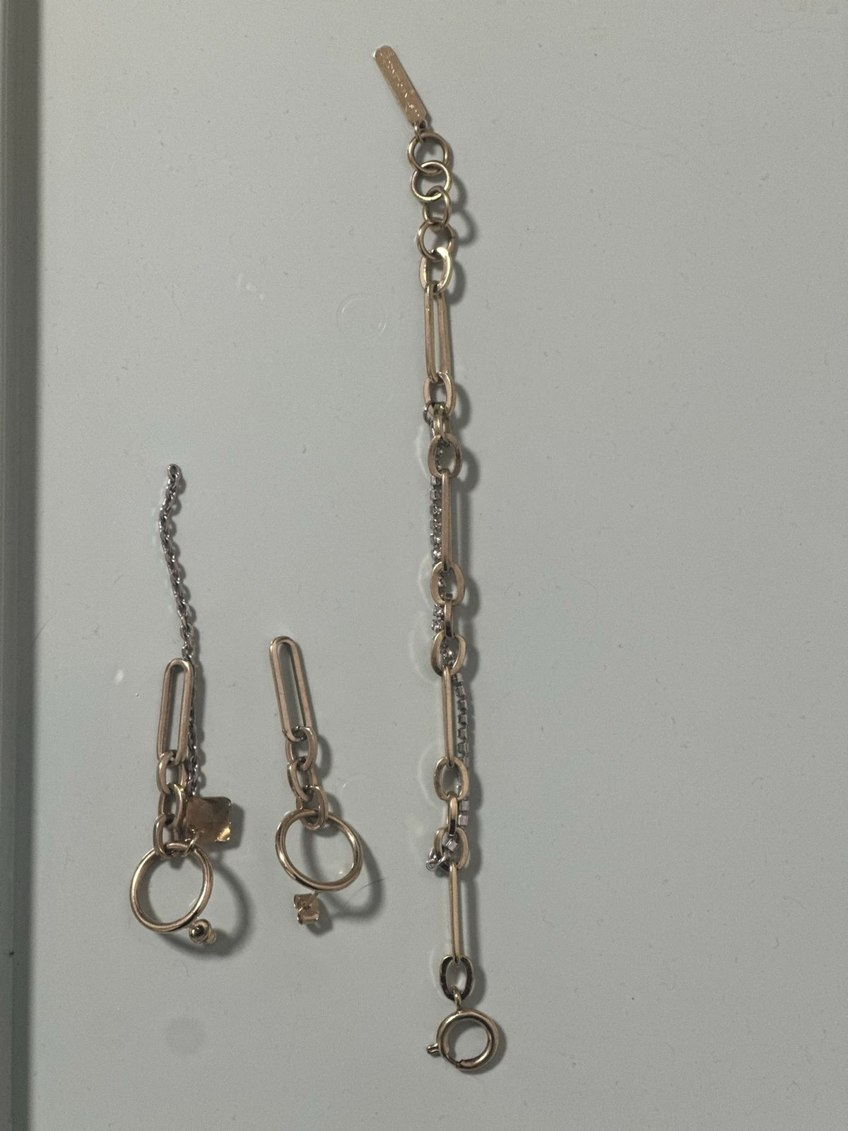 Justine Clenquet Bracelet and Asymmetric Earrings Set — front view