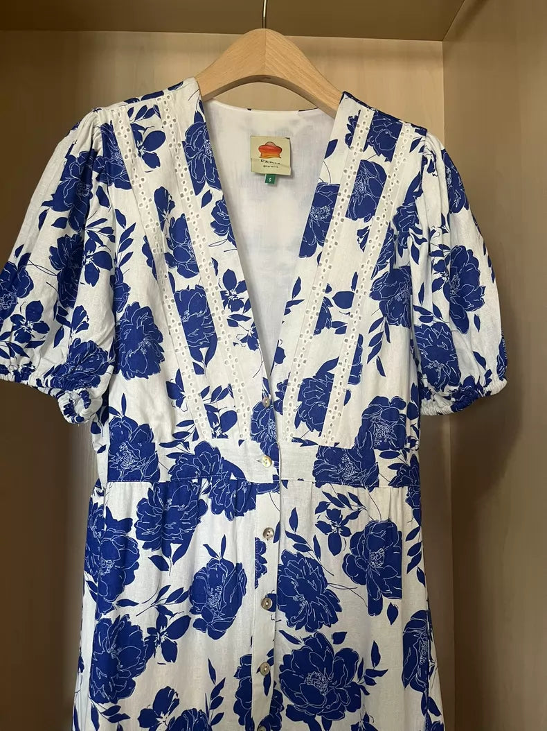 Cobalt botanical cotton midi dress — neckline detail