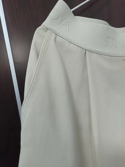 Stine Goya Beige High-Waisted Trousers – Shortened Hem – photograph 3