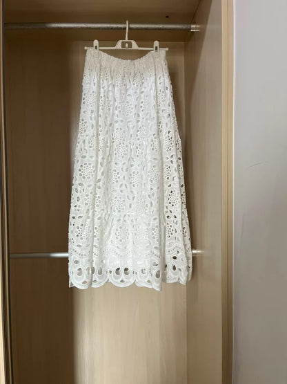 Ivory embroidered maxi skirt — hanging front view