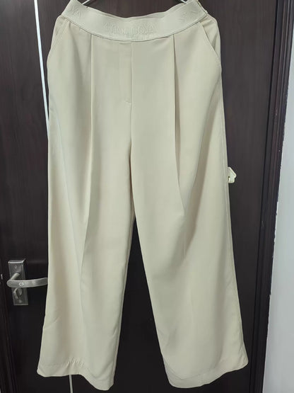 Stine Goya Beige High-Waisted Trousers – Shortened Hem – photograph 1