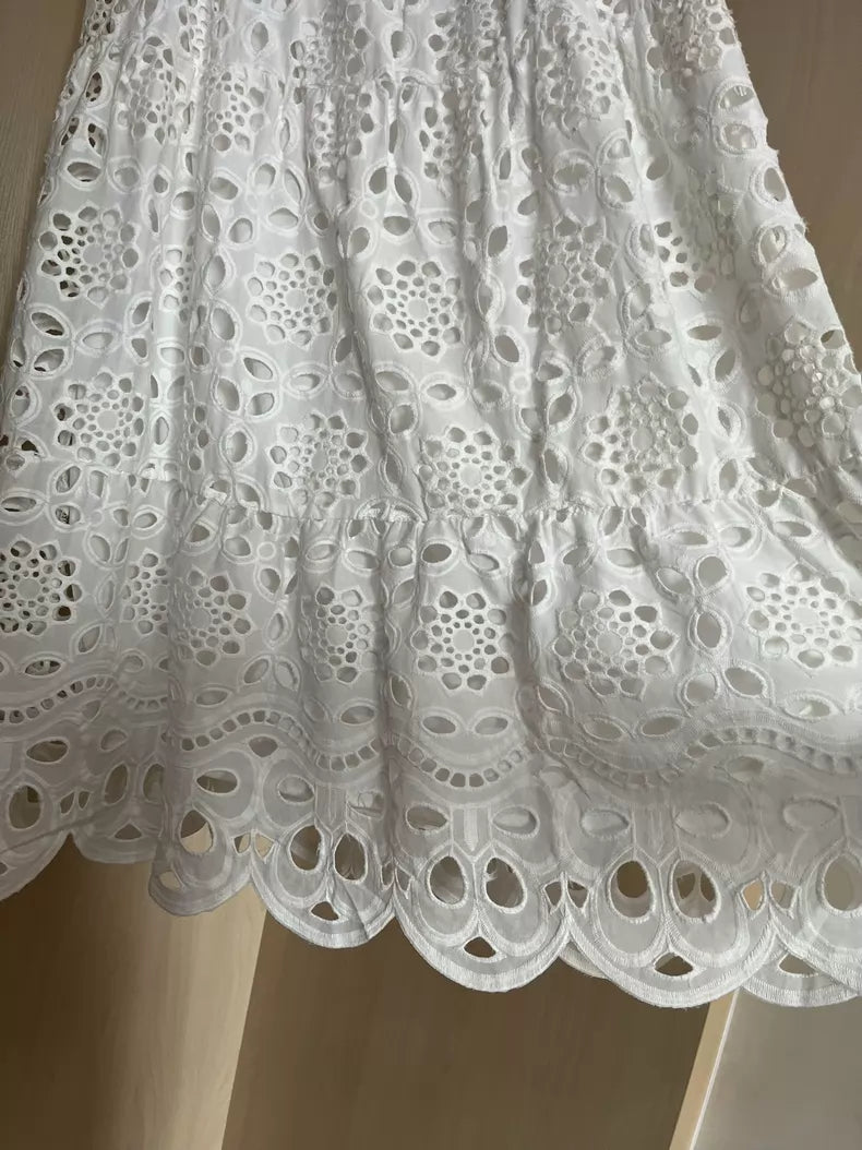 Ivory embroidered maxi skirt — hem detail