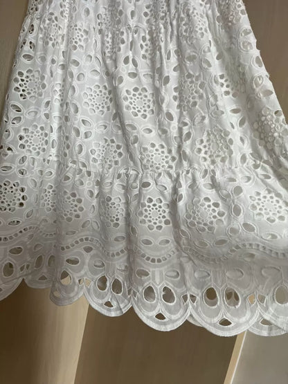 Ivory embroidered maxi skirt — hem detail