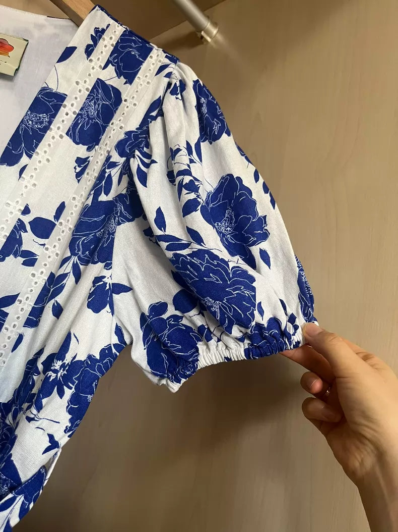 Cobalt botanical cotton midi dress — sleeve detail