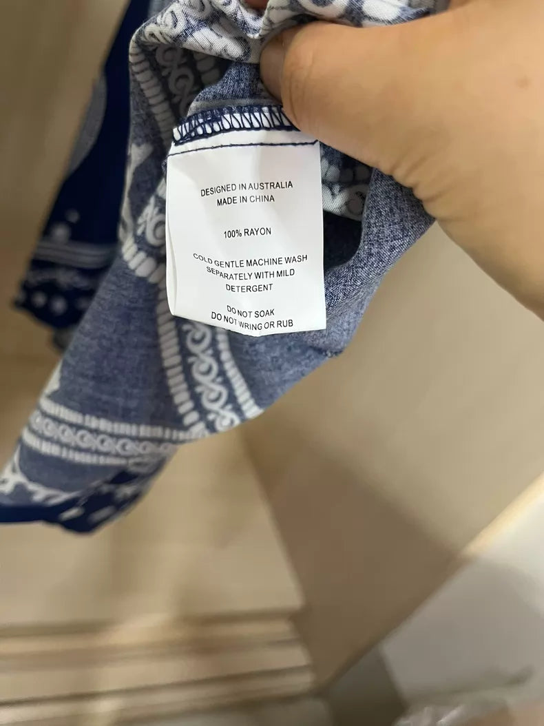 Navy printed camisole maxi dress — label detail