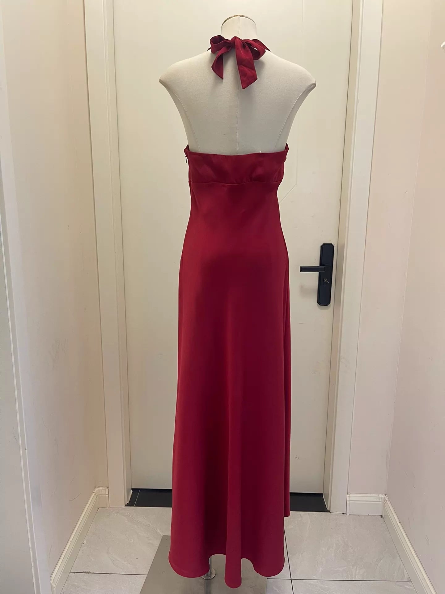 BCBGMAXAZRIA burgundy satin halter gown — back view