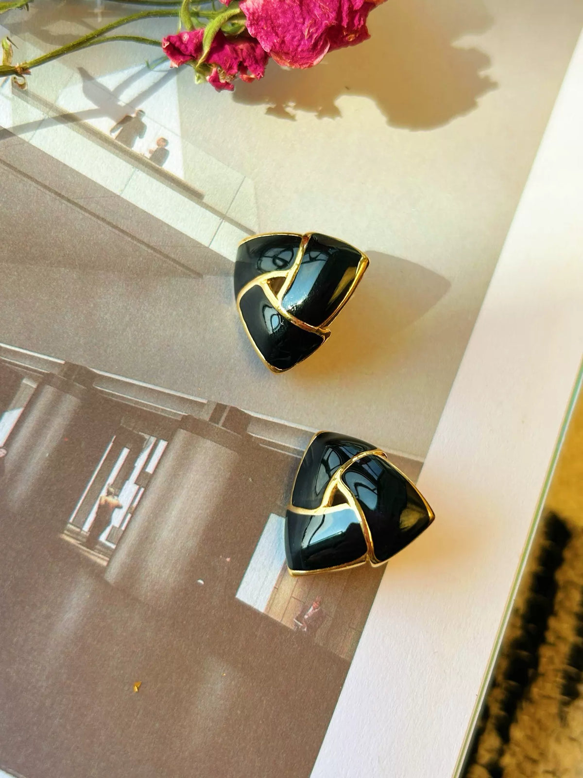 Monet Black and Gold Triangle Clip-On Earrings — front view
