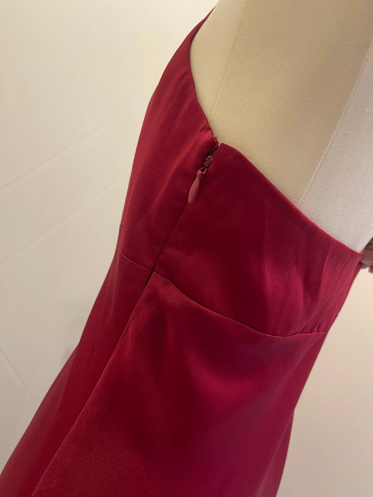 BCBGMAXAZRIA burgundy satin gown — fabric detail