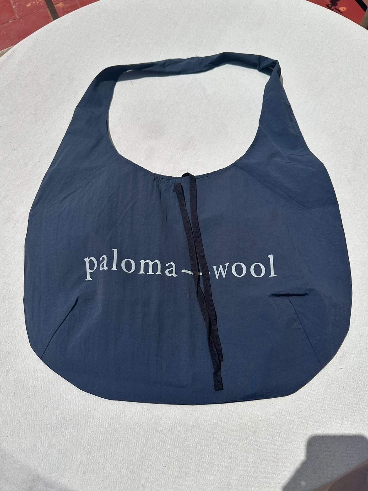 Paloma Wool Navy Soft Bag — front view