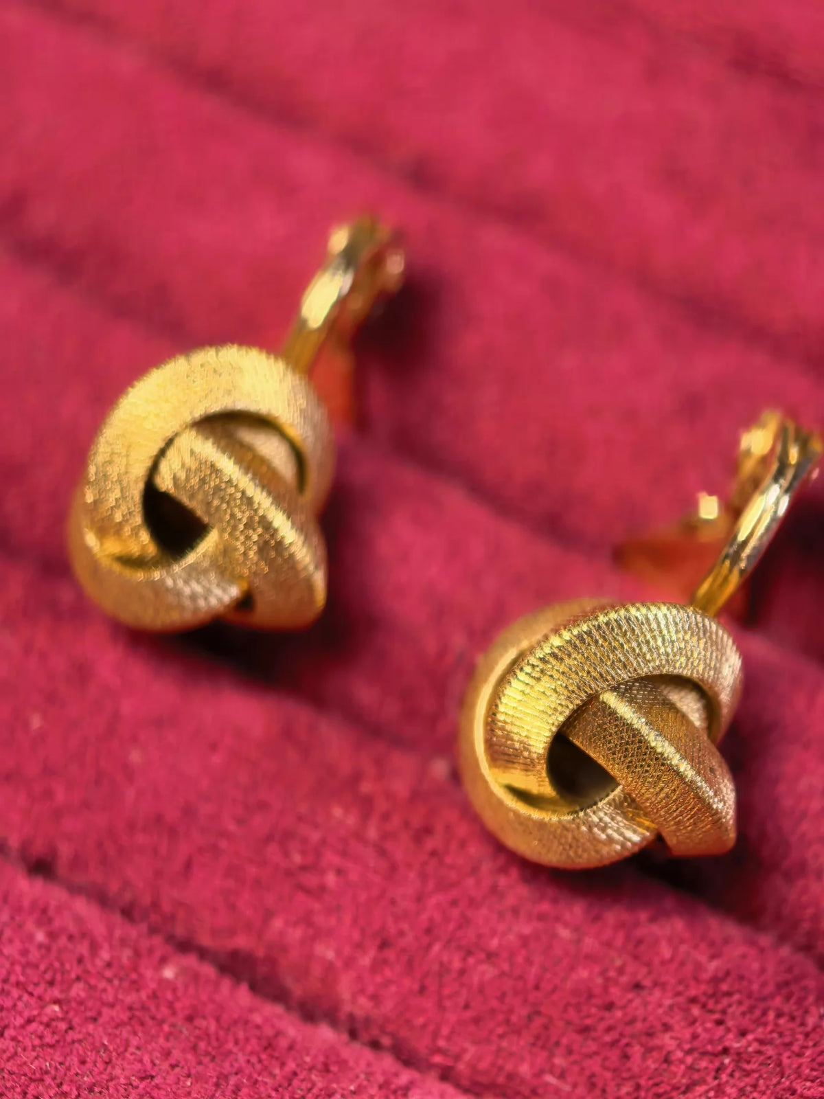 Monet Gold Knot Clip-On Earrings — front view