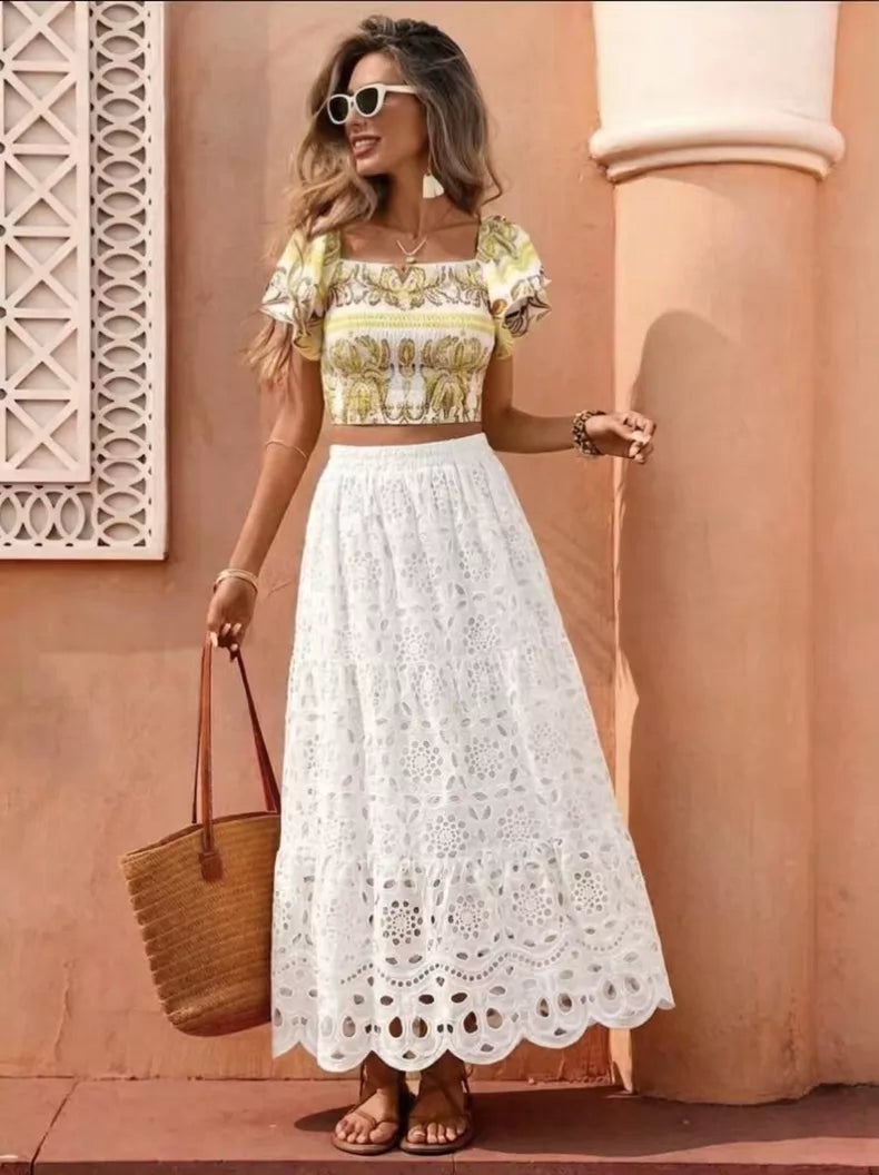 Ivory embroidered maxi skirt — styled front view