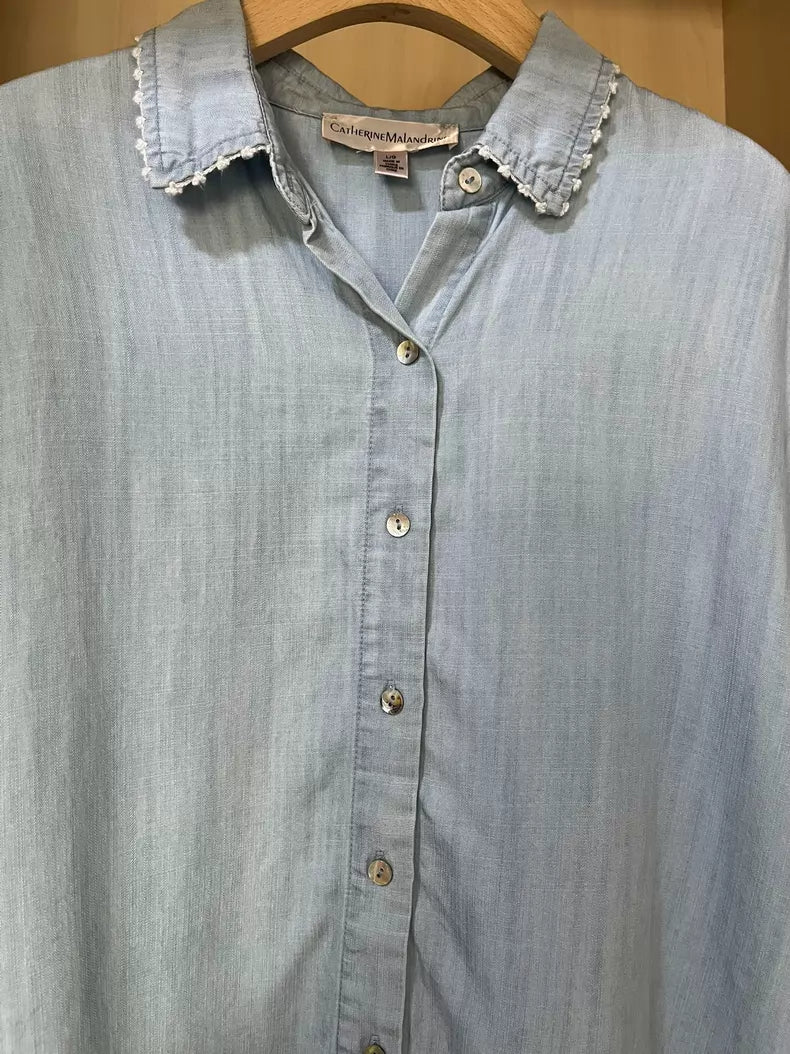 Lyocell crochet-trim blouse — hanging front view