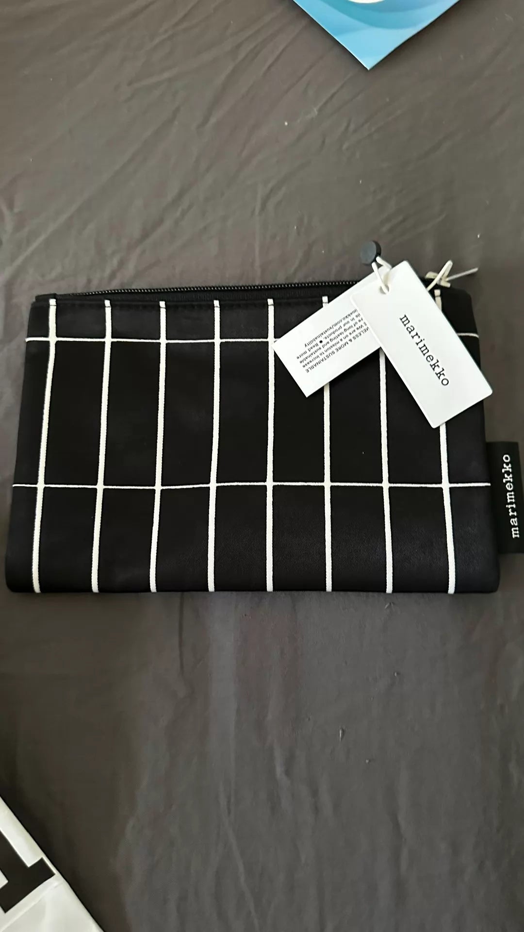 Actual Marimekko black and white grid zip pouch