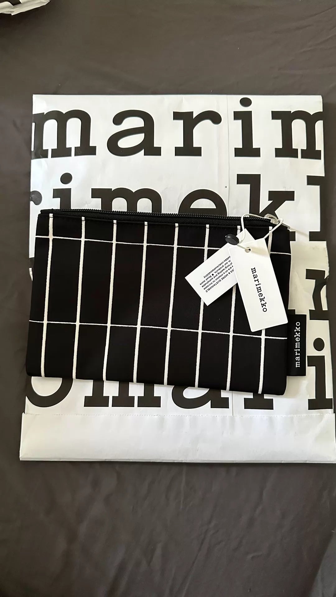 Actual Marimekko black and white grid zip pouch