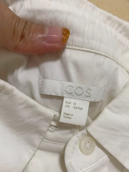 COS shirt brand and EU 32 label