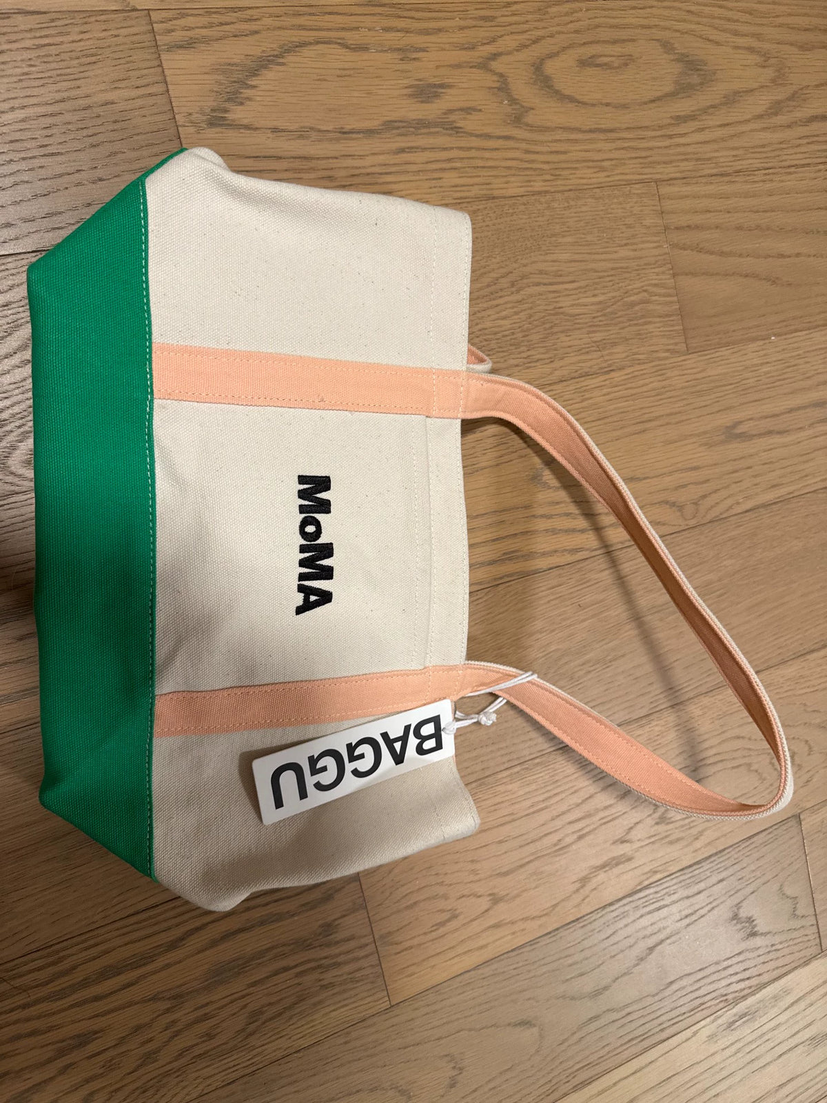Actual MoMA cream canvas tote with green base and pink handles