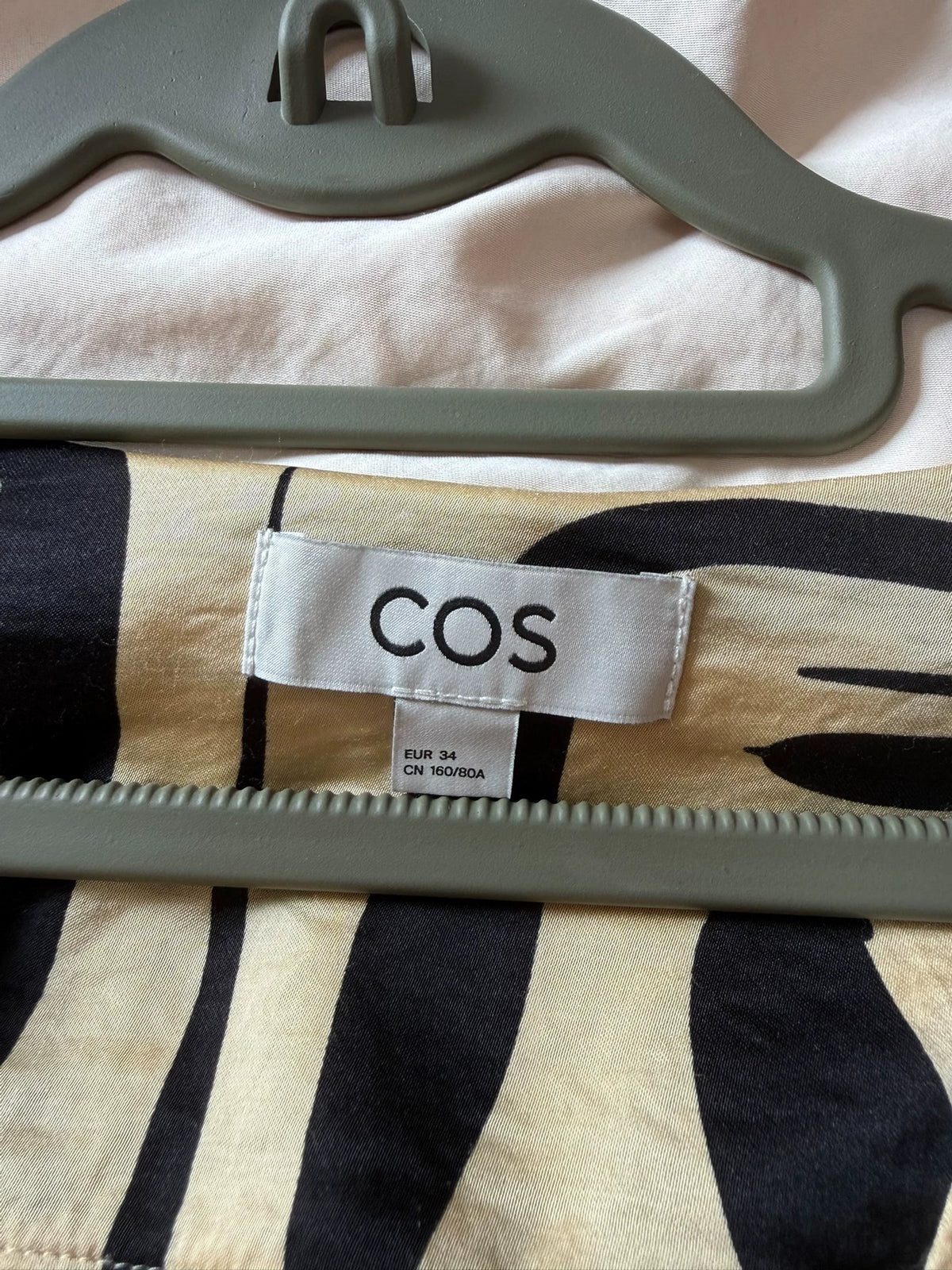 COS dress neckline and label