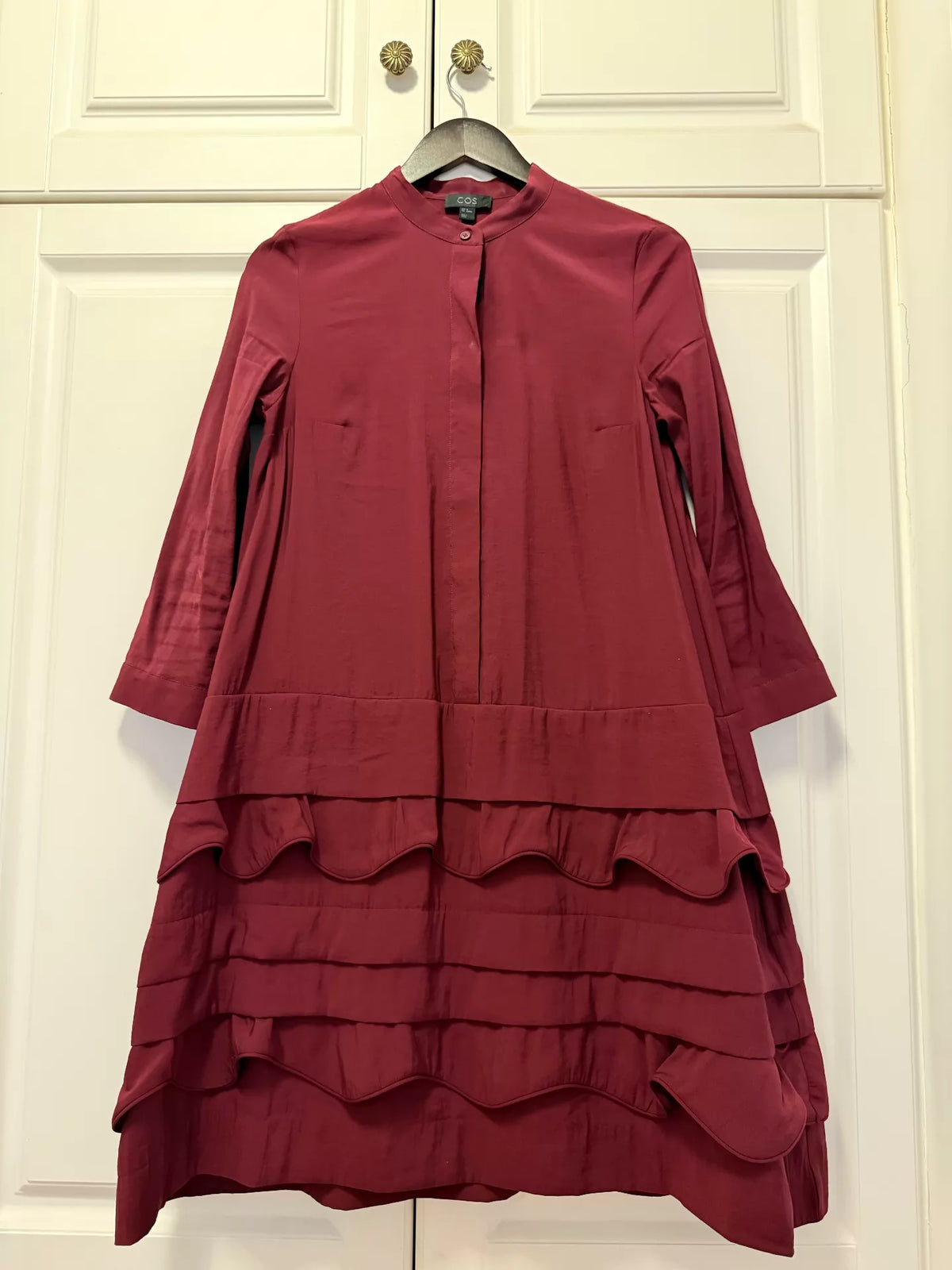 COS burgundy tiered ruffle-hem dress, front view