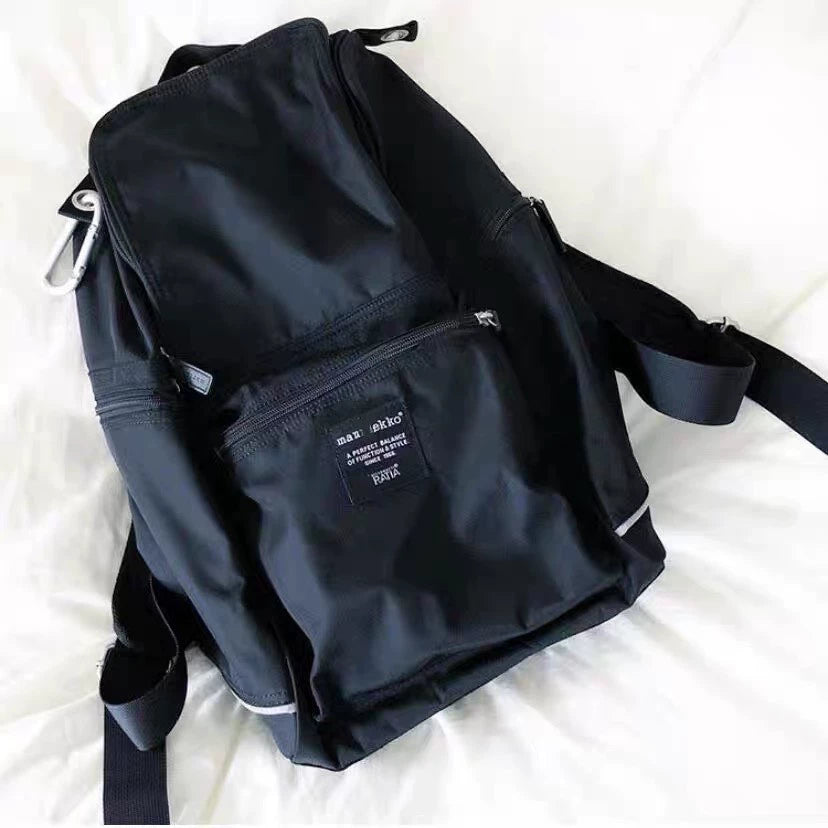 Marimekko Buddy black nylon backpack with front zip pocket
