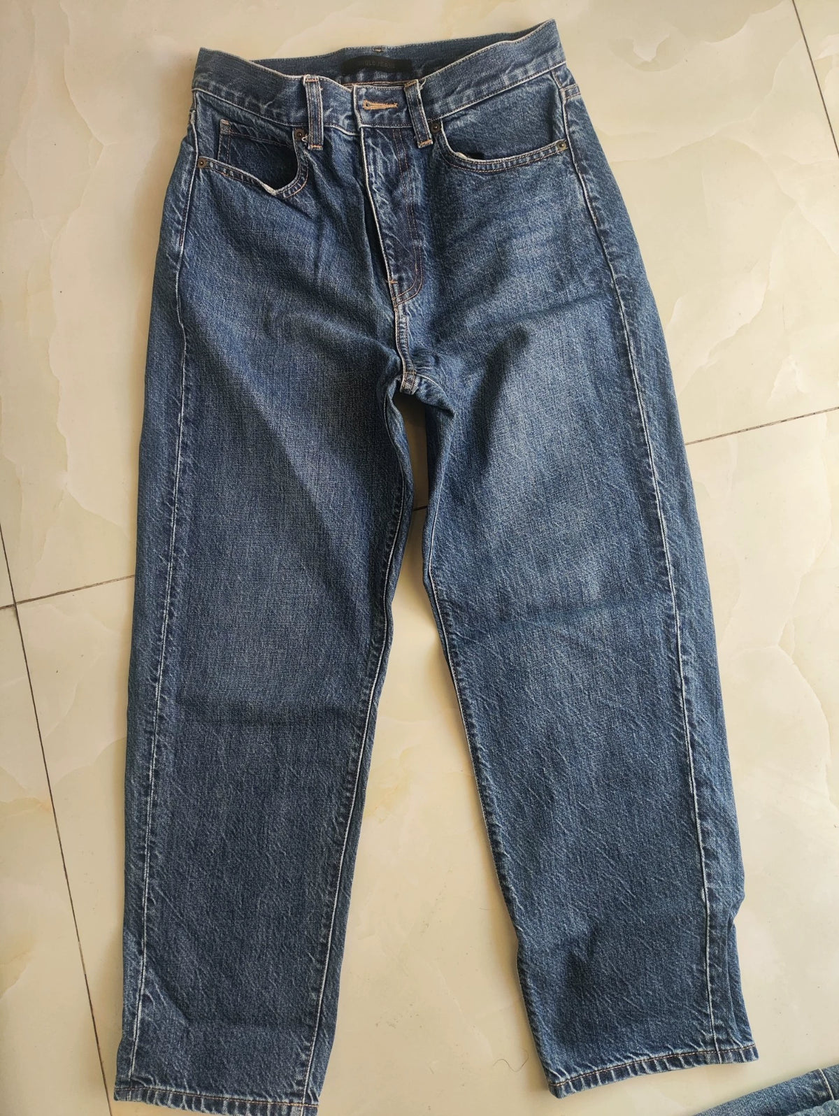 Uniqlo blue cotton straight-leg jeans, actual pair