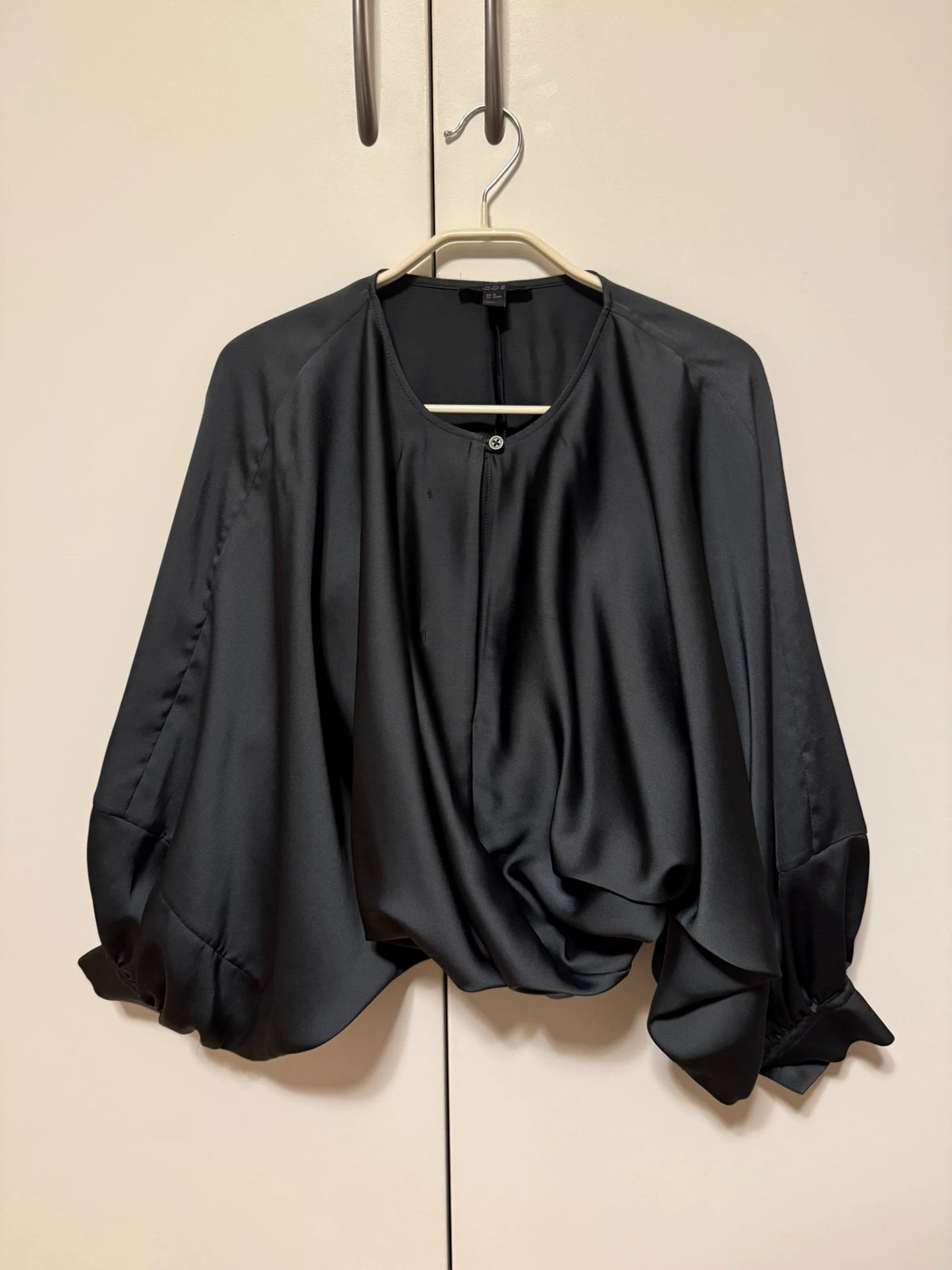 COS dark green draped blouse, front view